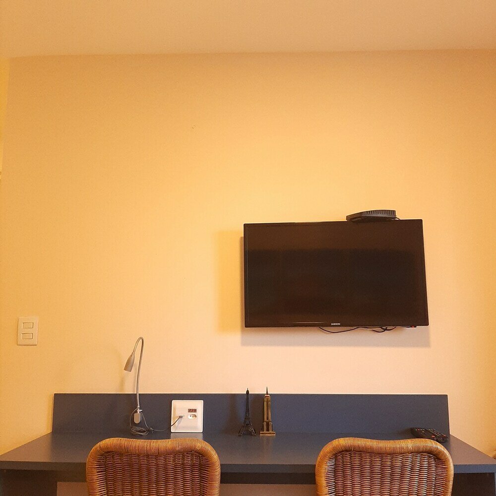 Фото Completo em Hotel Localização Perfeita