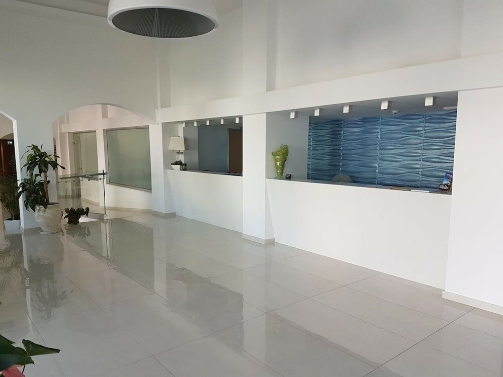 Фото Melini Hotel Suites