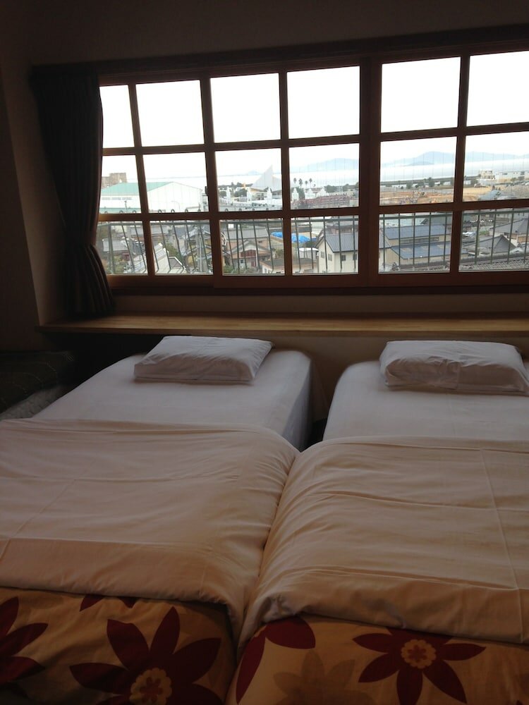 Фото Gamagori Orange Pension