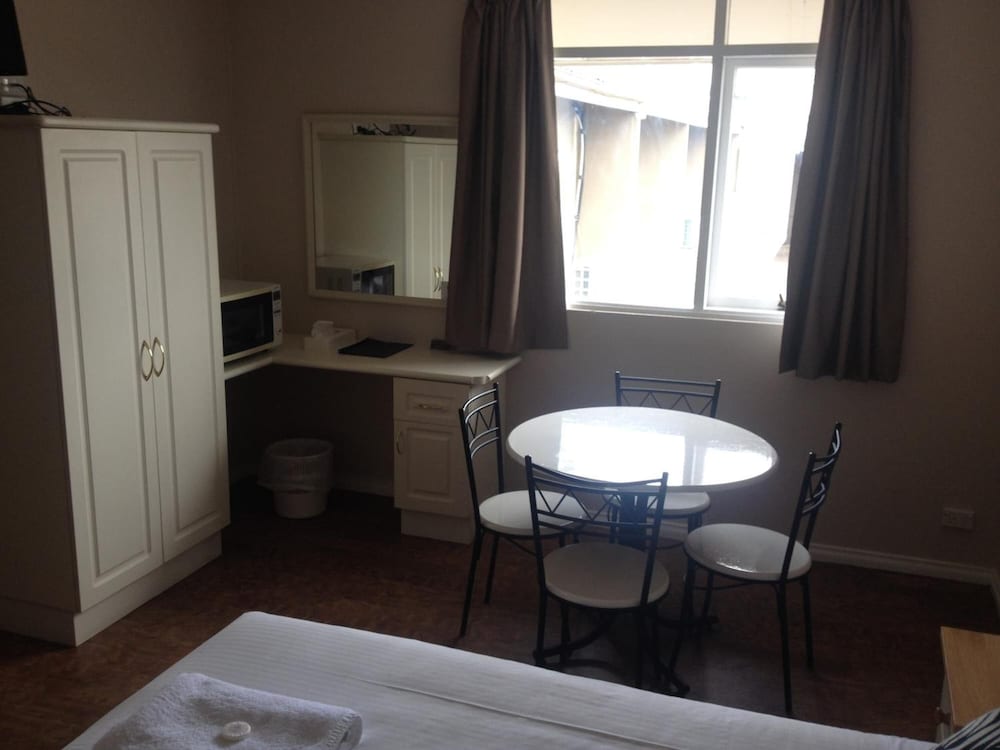 Фото Coachman Hotel Motel