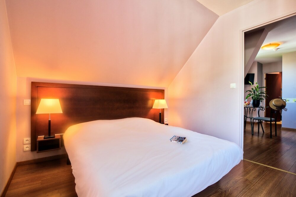 Фото Zenitude Hôtel - Résidences Les Jardins de Lourdes