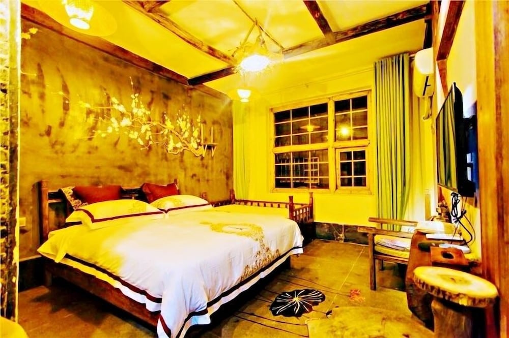 Фото Dielianhua Cowherd Inn Zhangjiajie