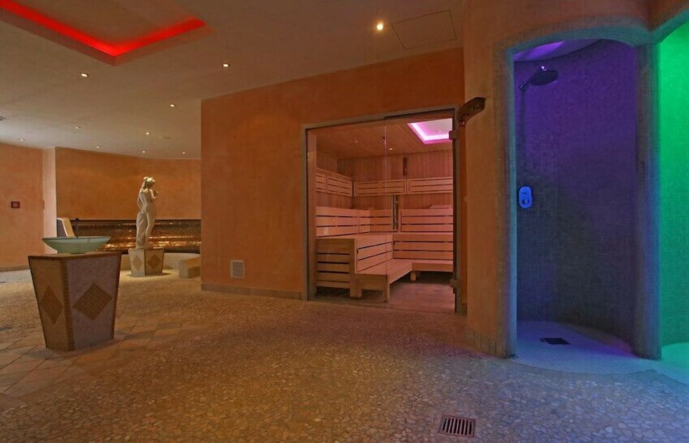 Фото Cliff Wellness Ferienwohnungen Ruegen