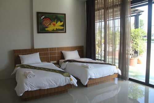 Гостиница Tawan Anda Garden Hotel в Сураттани
