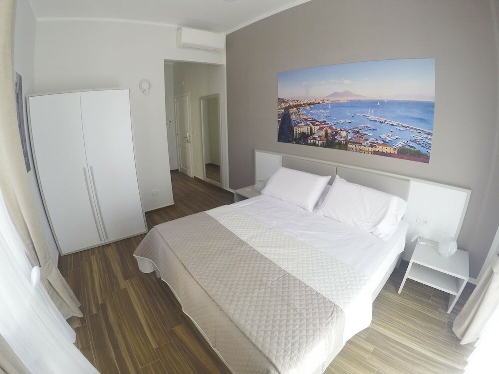 Фото Rooms Stazione Centrale