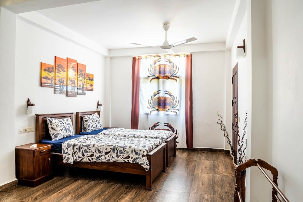 Фото Green Parrot Beach Resort