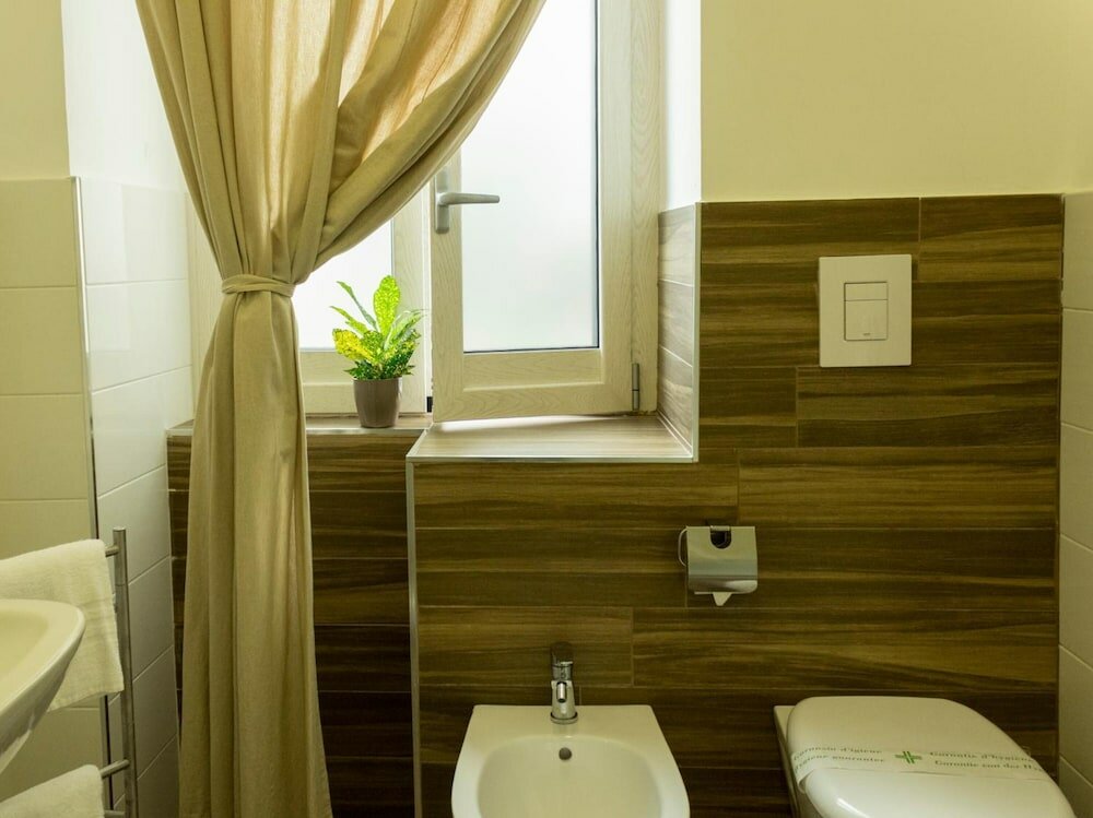 Фото Rooms Stazione Centrale