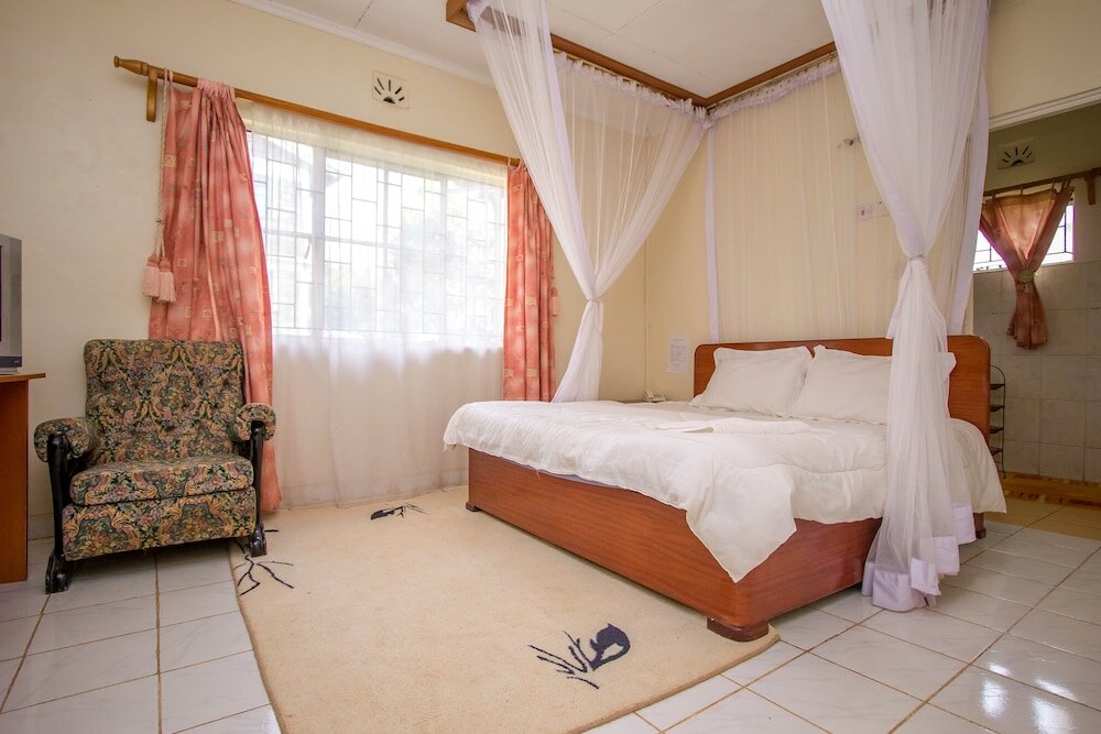 Фото Ivys Inn Guest House