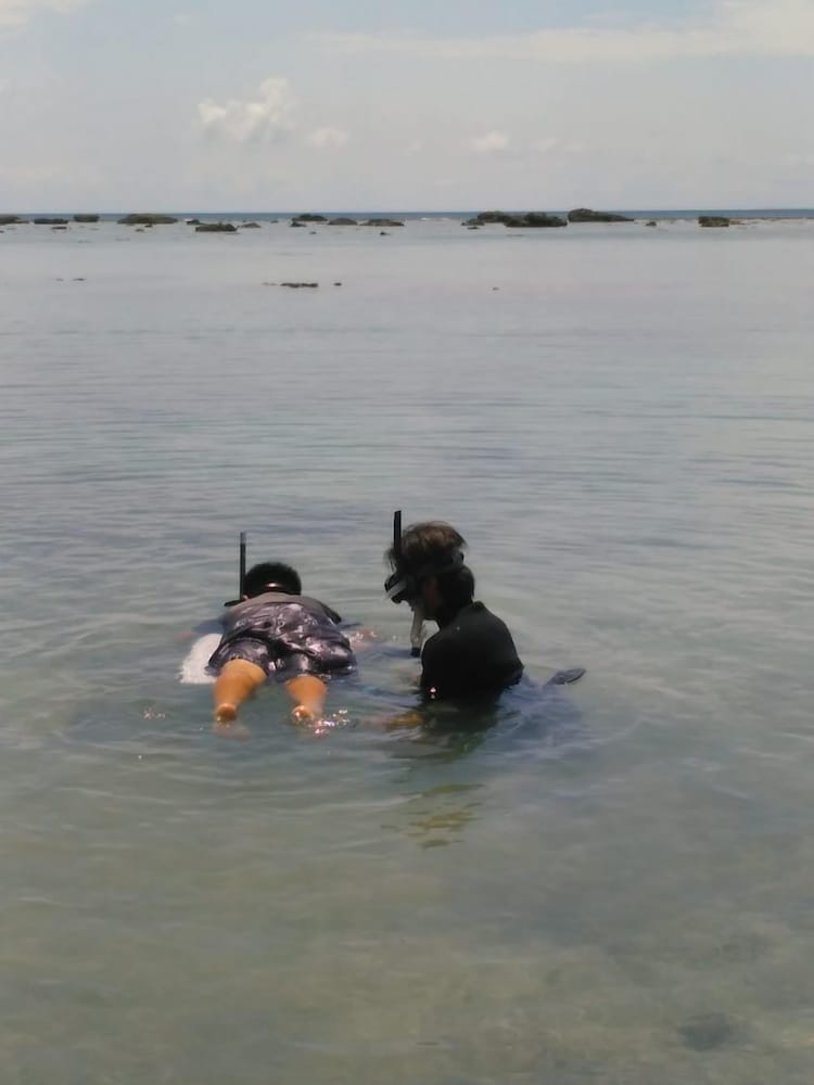 Фото Guesthouse Amami Long Beach