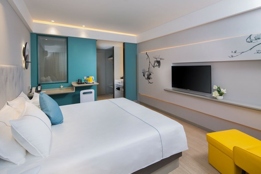 Фото Magnotel Hotel of Shanghai Jinjiang Park