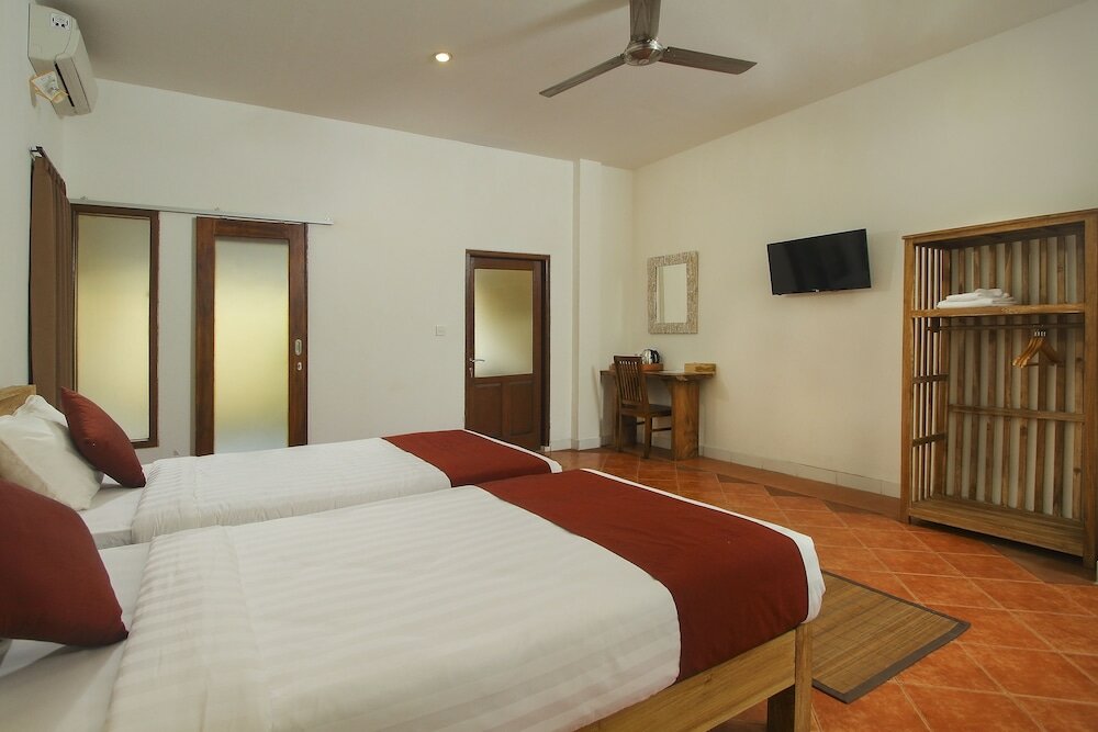 Фото Manggis Sari Guest House