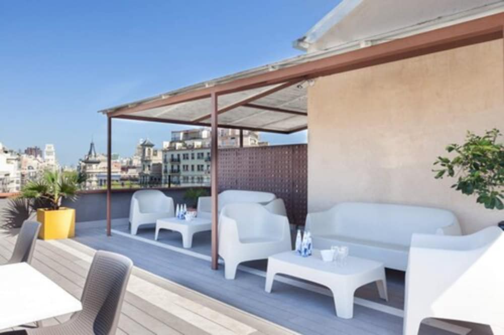 Фото Enjoybcn Miro Apartments