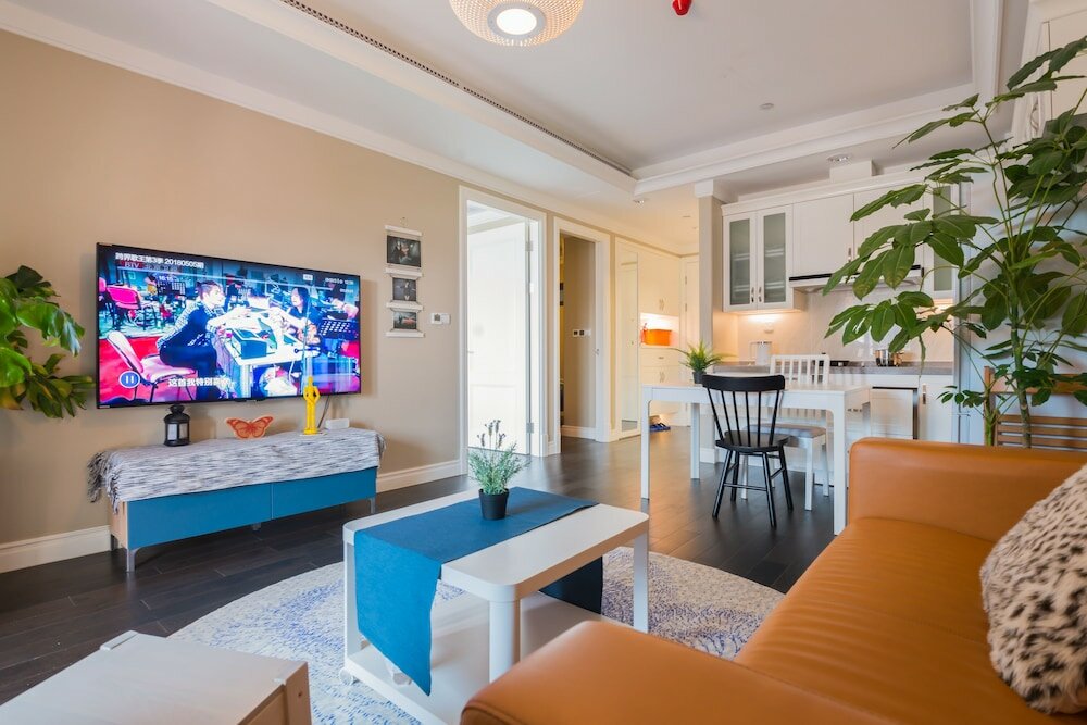 Фото Shanghai Xinchuan Boutique Apartment