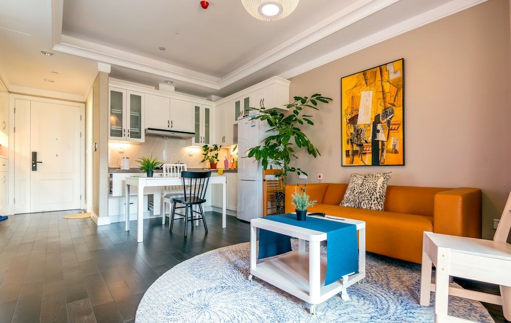 Фото Shanghai Xinchuan Boutique Apartment