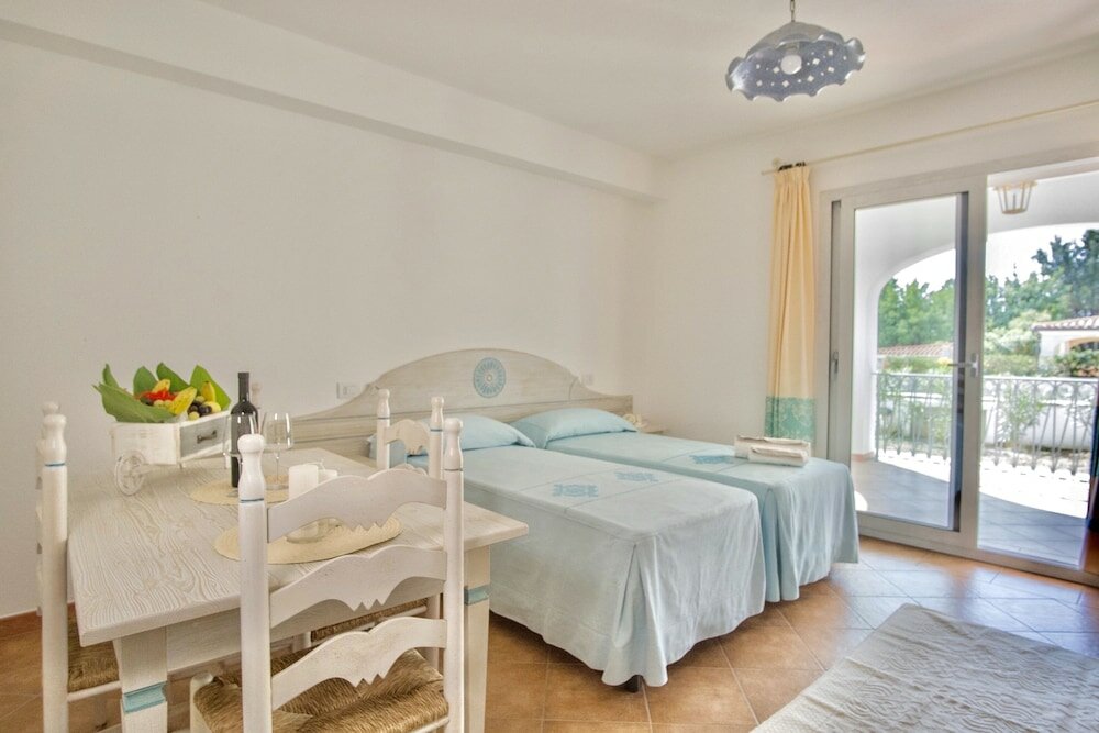 Фото Appartamenti con Wifi e A. C a Orosei