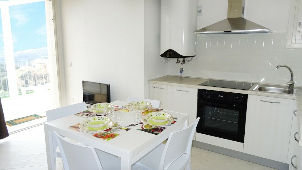 Фото Affittimoderni Isola Rossa Élite - Pati19