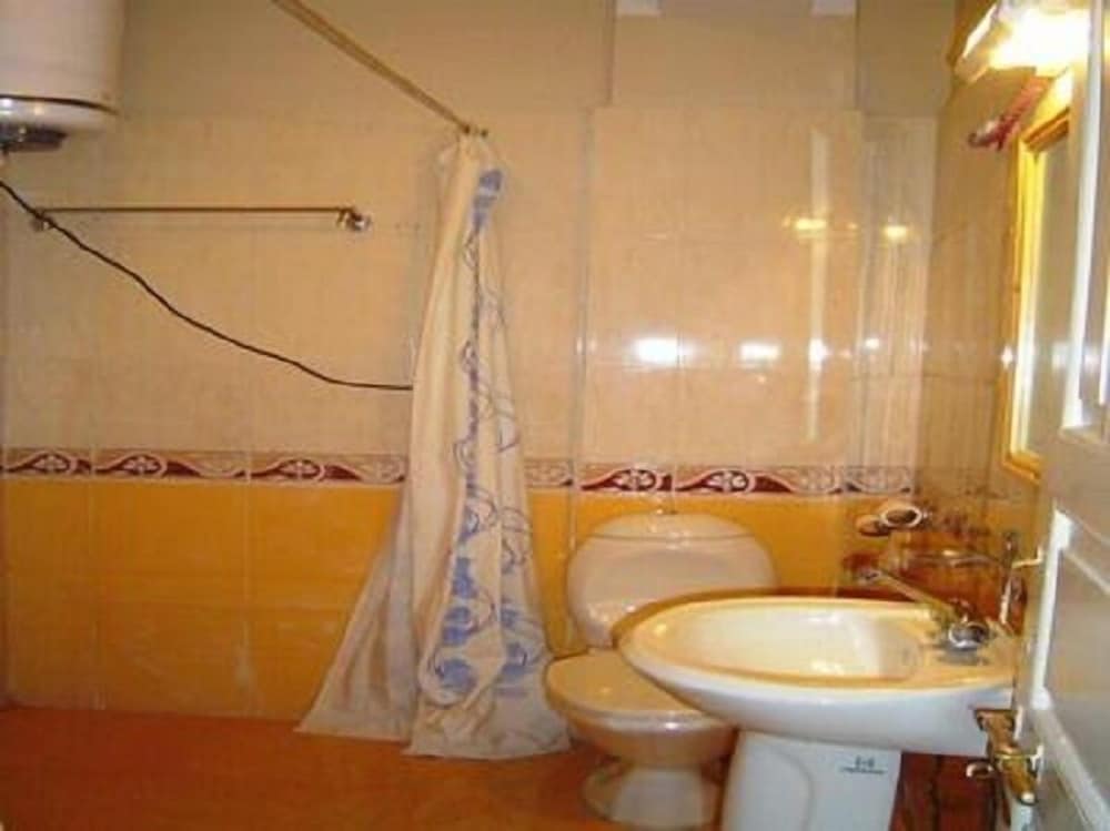 Фото Hotel New Singye