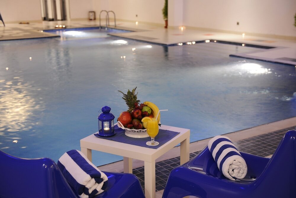 Фото Al Hamra Palace by Warwick