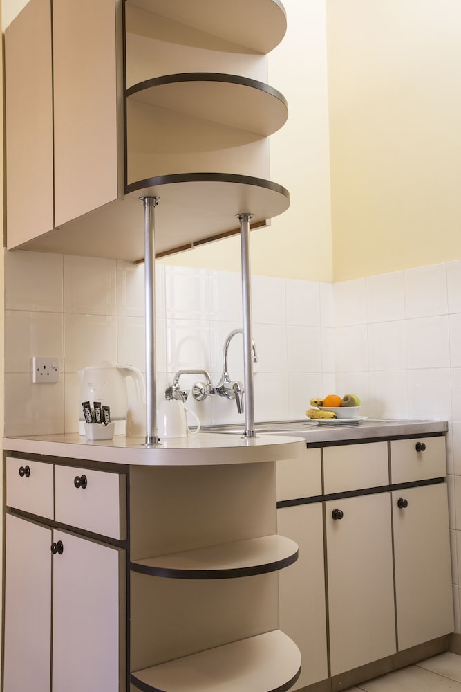 Фото Pigeon Beach Hotel Apartments