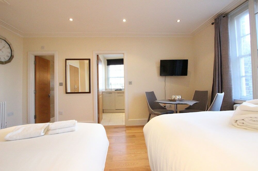 Фото Cosy Central Apartments - Oxford Street