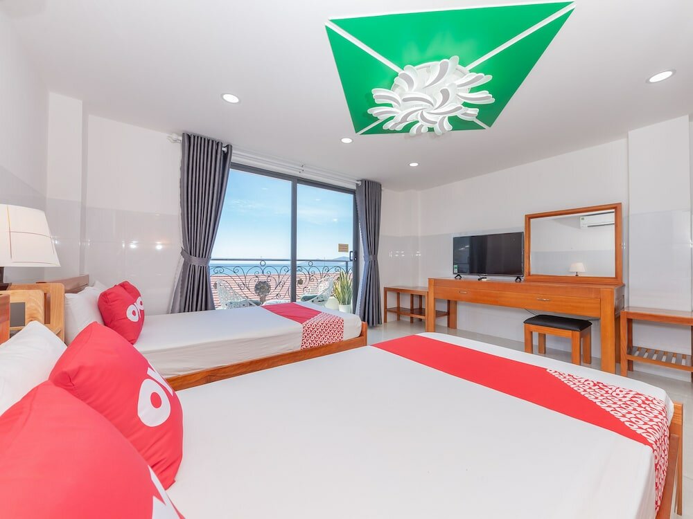 Фото Oyo 1028 Flower House Apartment