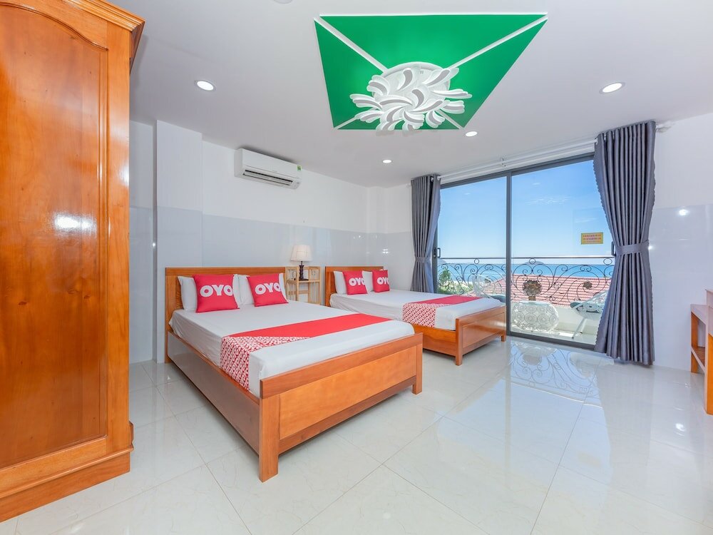 Фото Oyo 1028 Flower House Apartment