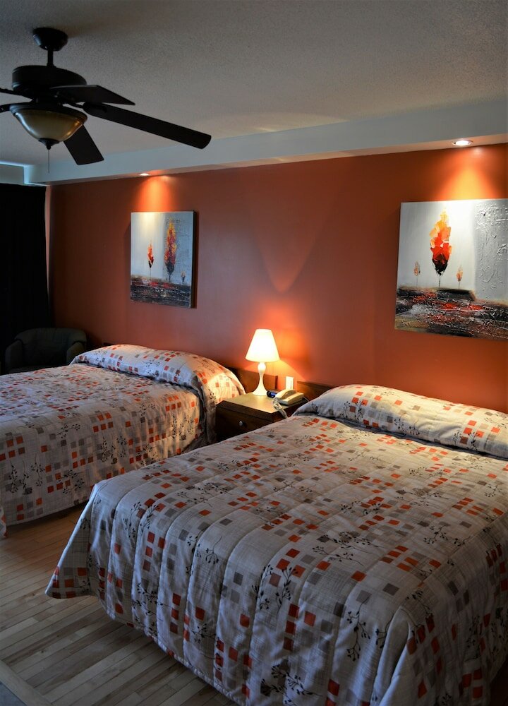 Фото Motel Quatre Saisons