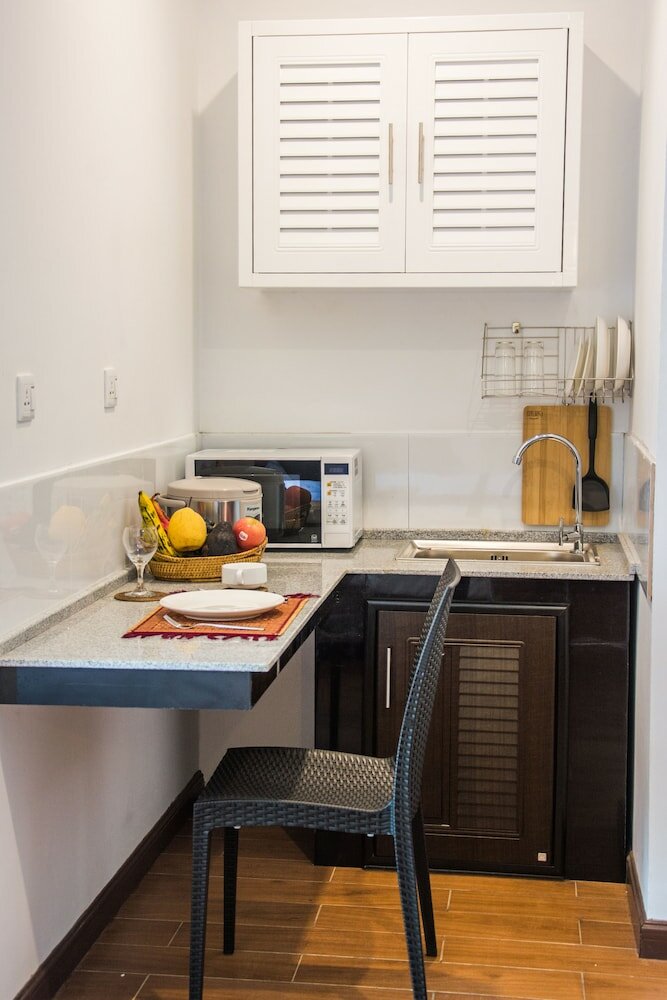 Фото Woodside Inn & Serviced Apartments