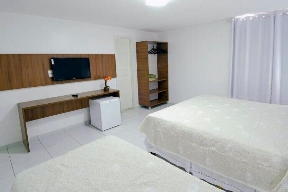 Фото Pousada Tambau Familly