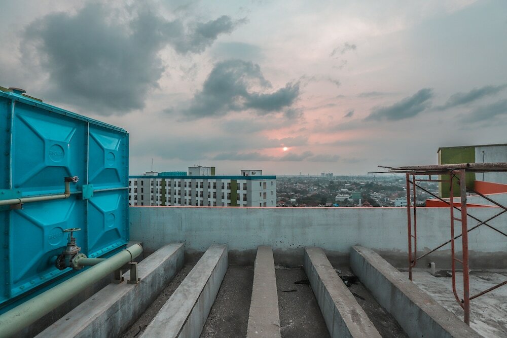 Фото Oyo 498 Green Lake View Ciputat Syariah