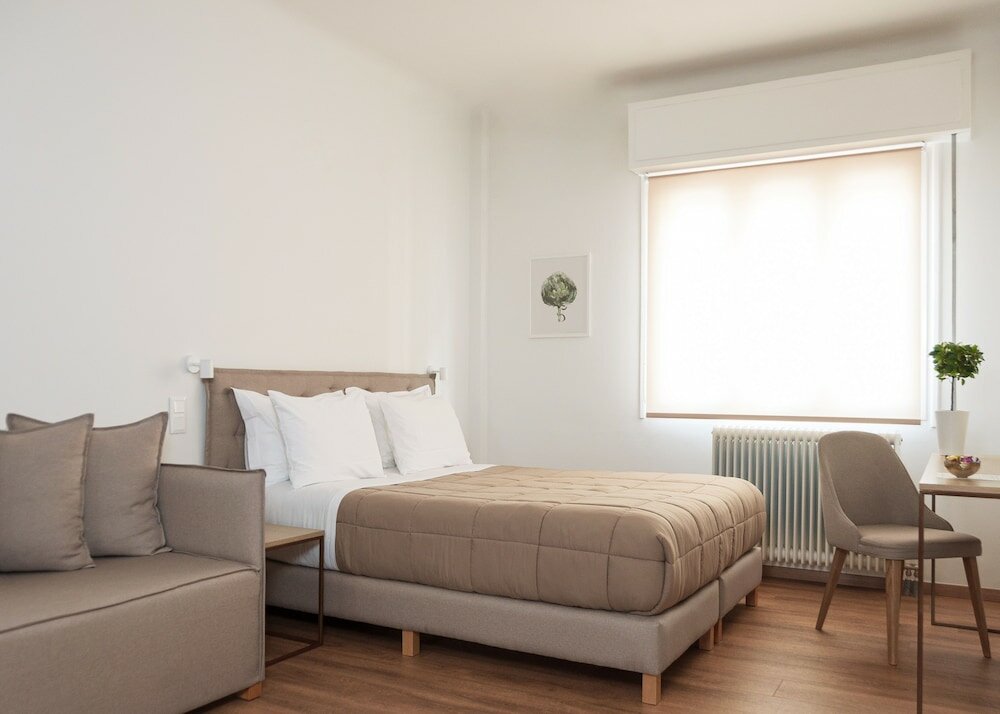 Фото Voulis Attico Rooms & Apartments