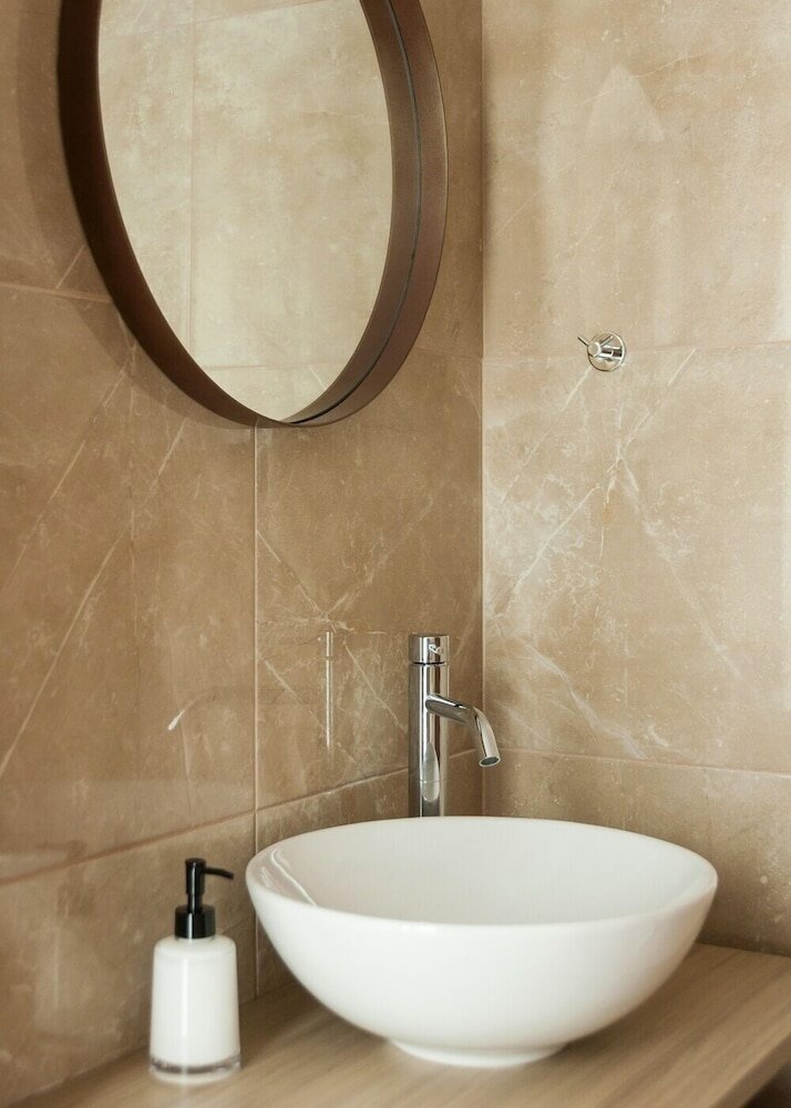 Фото Voulis Attico Rooms & Apartments