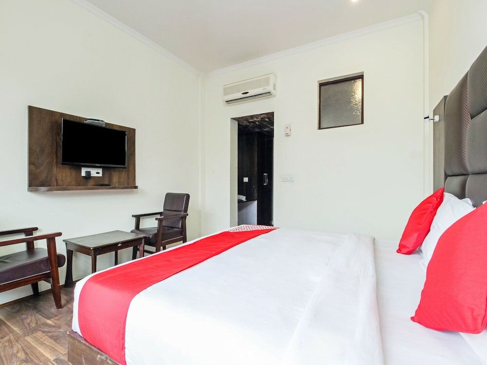 Фото Capital O 29999 Hotel Green Ambition