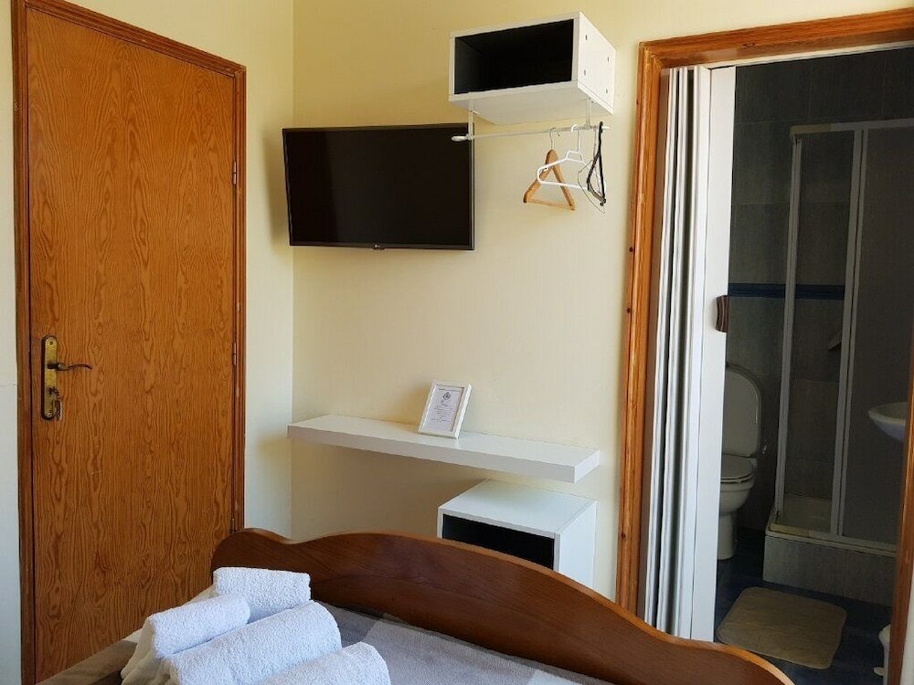 Фото Pensão Leão De Ouro