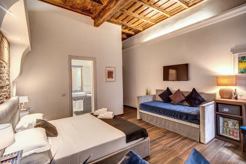 Фото Piazza di Spagna Comfort Rooms