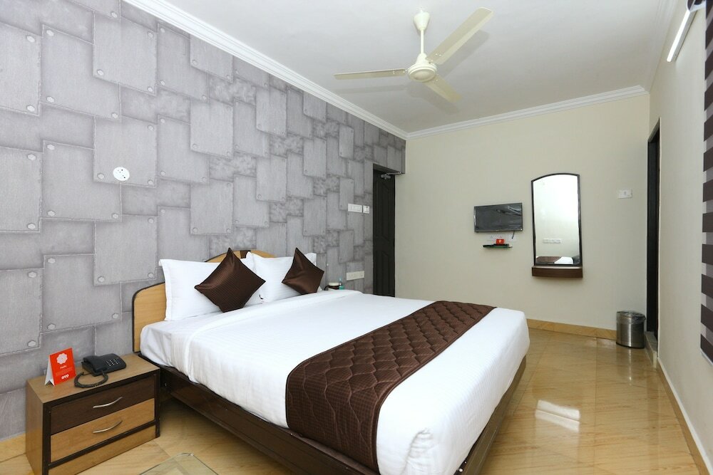 Фото Oyo 9372 Rich Inn