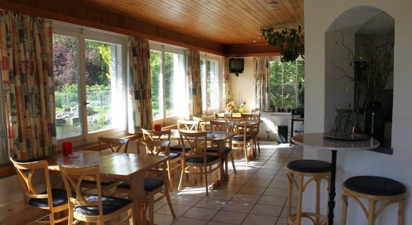 Фото Adventure Guesthouse Interlaken