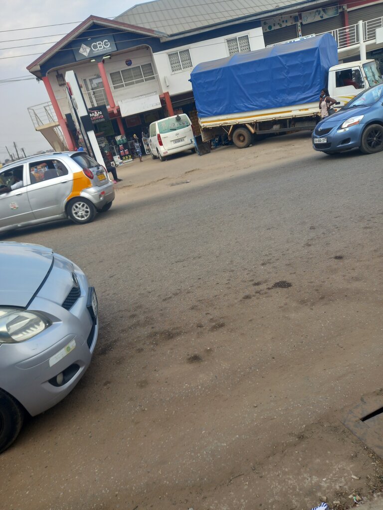 Clothing store Superman, Accra, photo