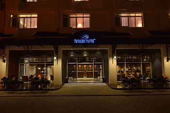 Фото Paradise Suites Hotel