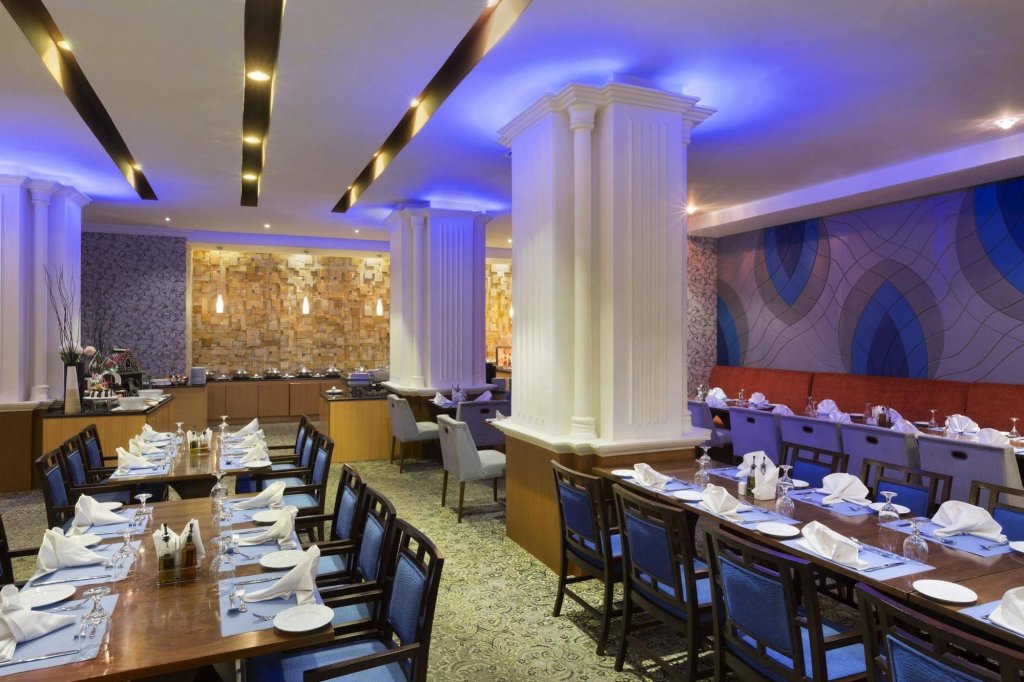 Фото Ramada Al Qassim Hotel And Suites