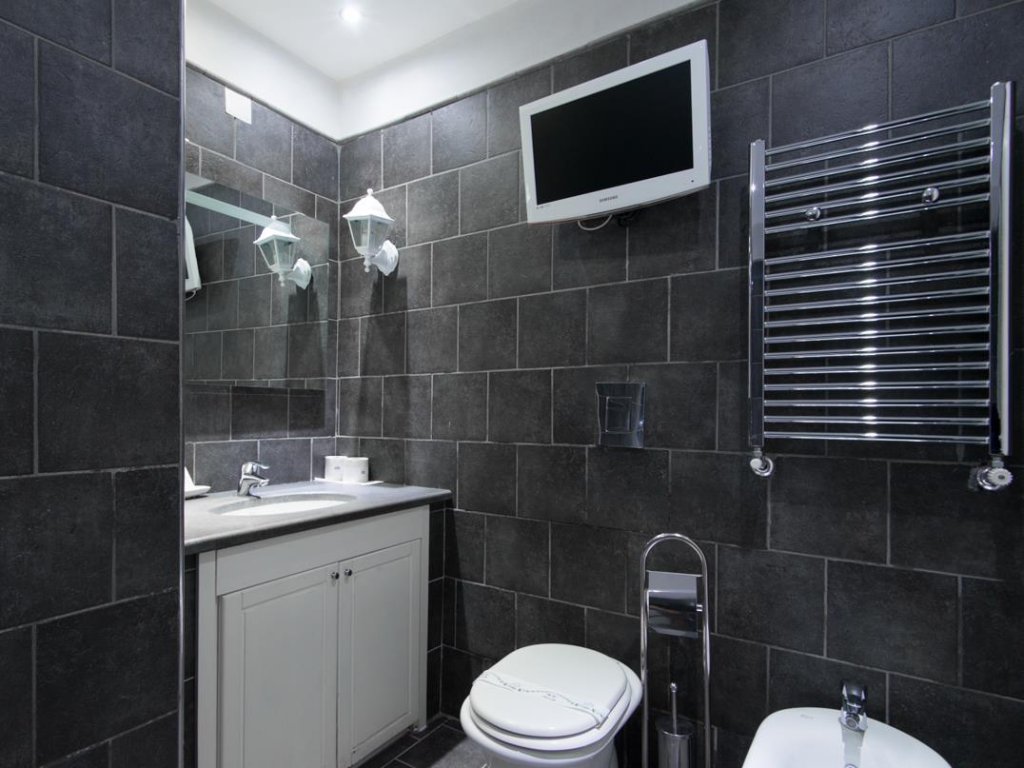 Фото Covo degli Angioini - Town House Suites