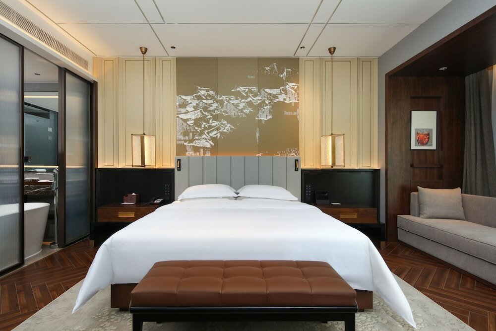 Фото Tiegang Jinjiangduchengjiudian