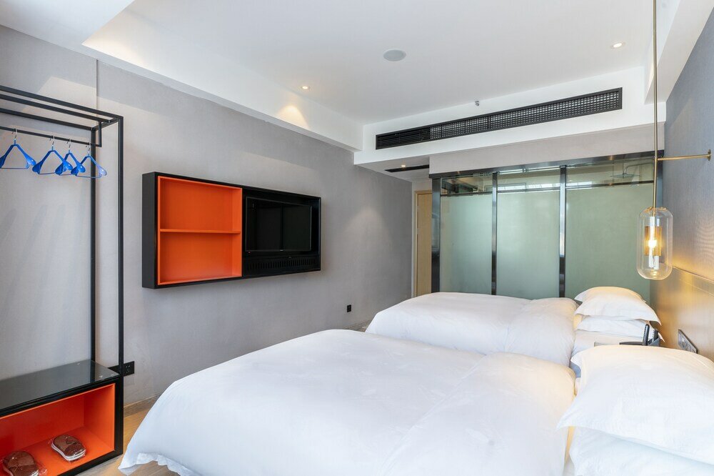 Фото Yì Wū Shì Bó Yì Měi Jū Hotel