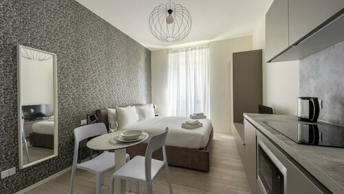 Апартаменты Italianway - The B Village Business в Ломбардии