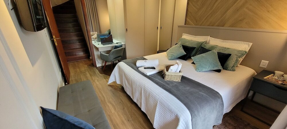 Фото Dúplex Luxo com Piscina Aquecida, Lareira e Wifi