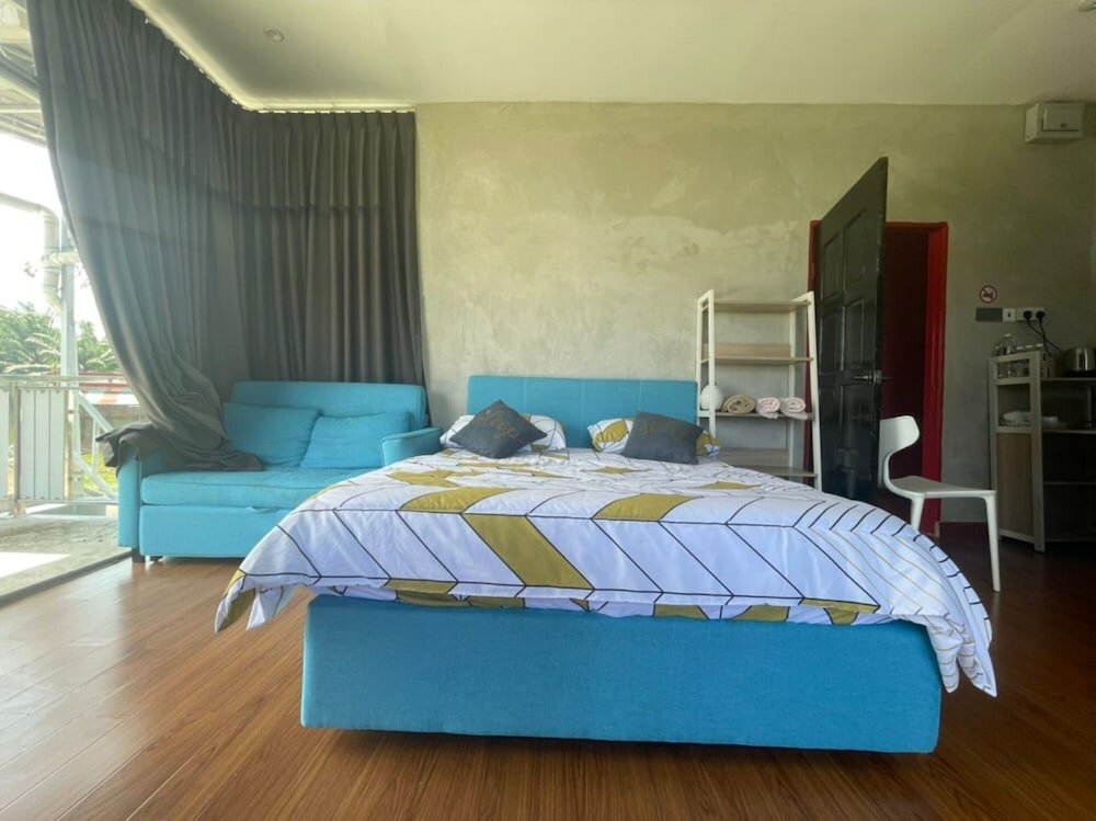 Фото Oyo Home 90370 D'tampi Homestay