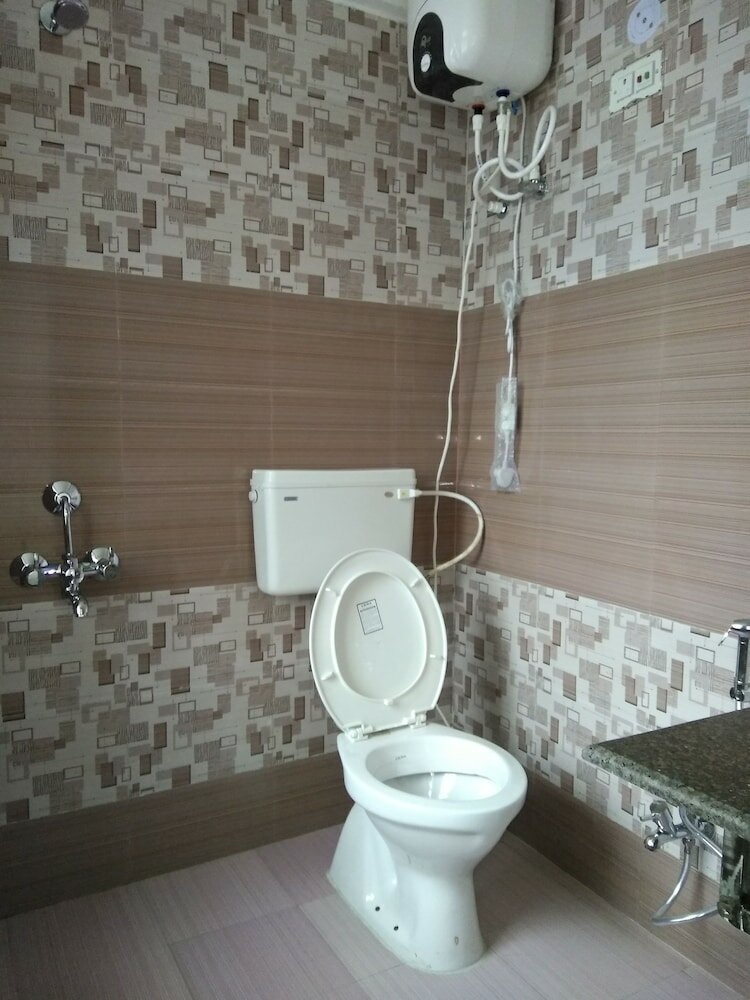 Фото Hotel Zero Mile Rooms