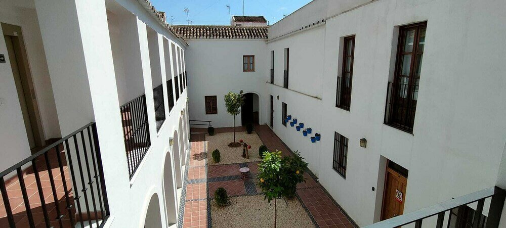 Фото Apartamentos Puerta Sevilla De Cordoba