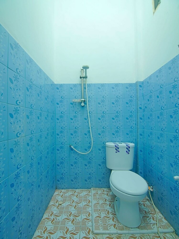 Фото Oyo 91730 De' Mande Homestay Syariah