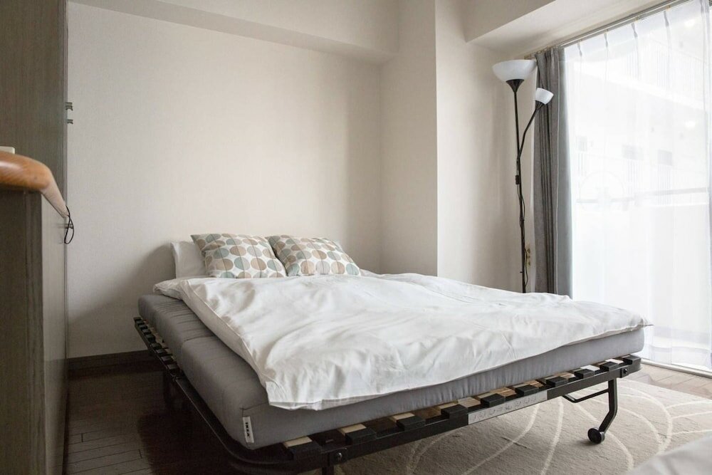 Фото Shinsaibashi Midtown Apartments